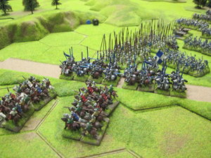 The Yorkist cavalry and pike advance to a line 2 hexes away from the escarpment