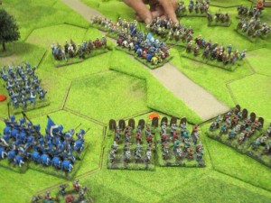 French knights, both foot and mounted charge into combat to push the Ottoman centre backwards.