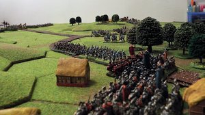 A broiling mass of enraged barbarian infantry advance towrds the waiting orc lines